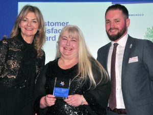 Andrew Simpson of the Coal Authority, right, with the awards host, comedian and writer Jo Caulfield