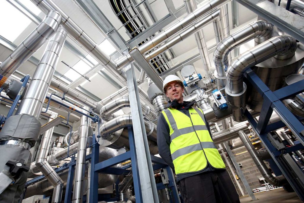 Jim Gillon – Energy Services Manager, of Gateshead Council, in the energy centre that recovers heat from mine water and distributes to the heat network (copyright Coal Authority 2023)